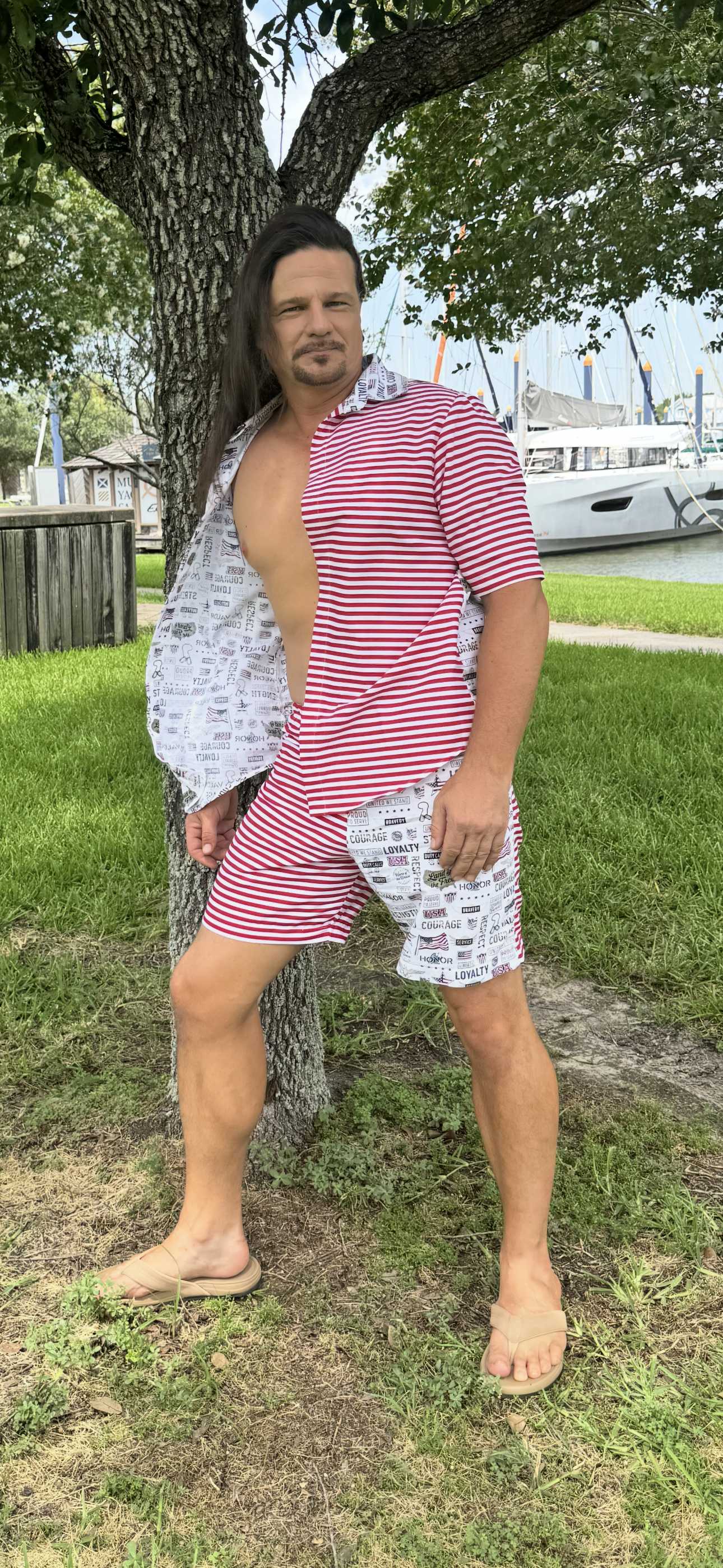 Men’s. Set two pieces, shirt + shorts. Medium size. White, red and white lines pattern.