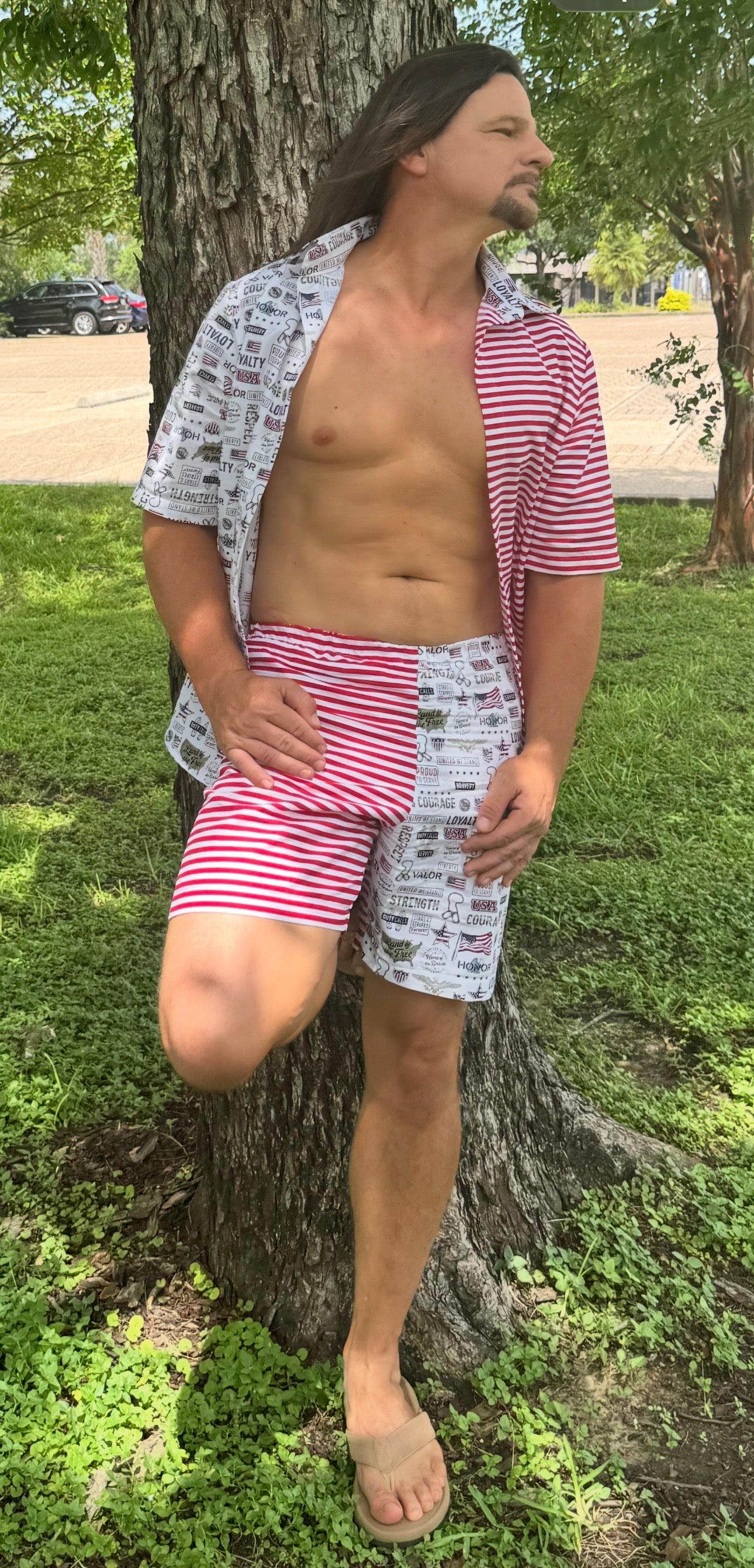 Men’s. Set two pieces, shirt + shorts. Medium size. White, red and white lines pattern.